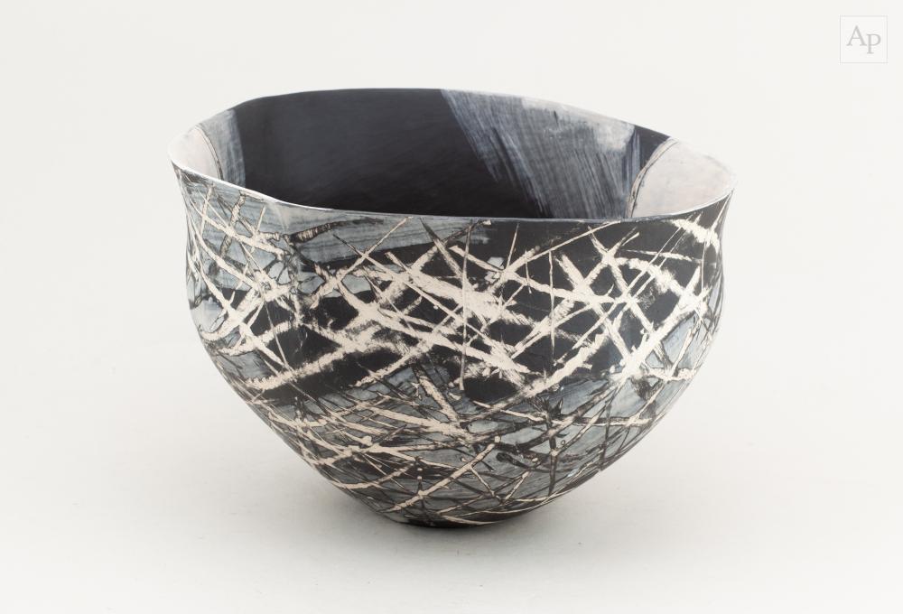 Carolyn Genders comparable auction result: carolyn genders born 1957 winter moon an earthenware vessel covered in monochrome vitreous slip decoration incised cg and year number code width 28 5cm height 18 5cm