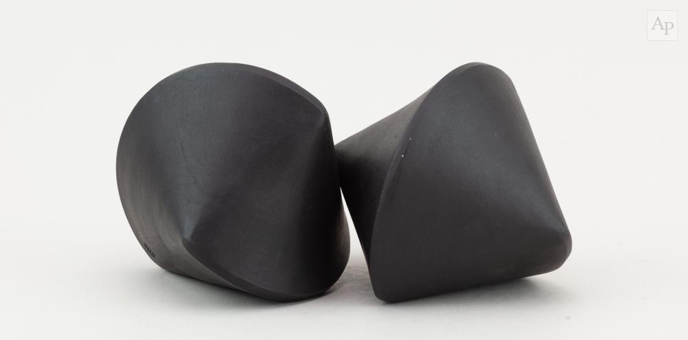 Eric Moss comparable auction result: eric moss born 1959 sphericon couple a two part black stoneware sculpture impressed marks tallest 10 5cm 2