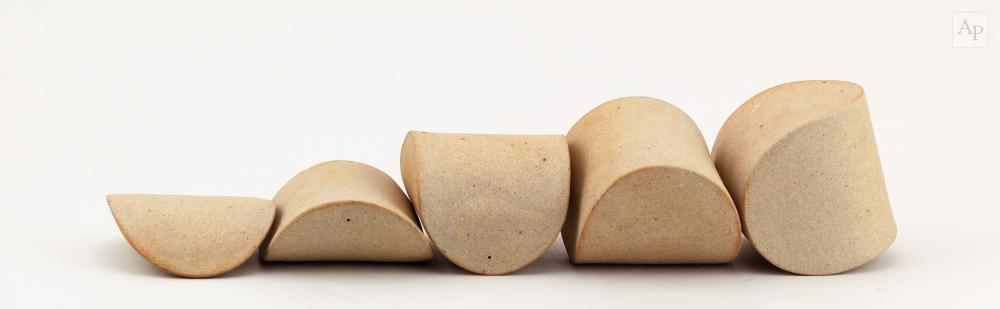 Eric Moss comparable auction result: eric moss born 1959 waveform transform a five part repositionable buff stoneware sculpture impressed marks tallest 9cm 5