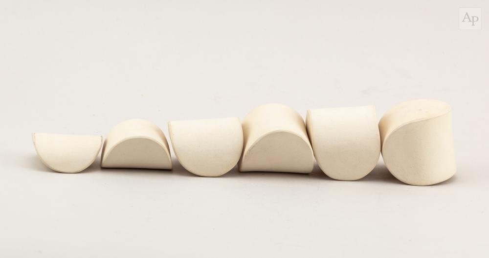 Eric Moss comparable auction result: eric moss born 1959 waveform transform a six part repositionable white stoneware sculpture impressed marks tallest 6cm 6