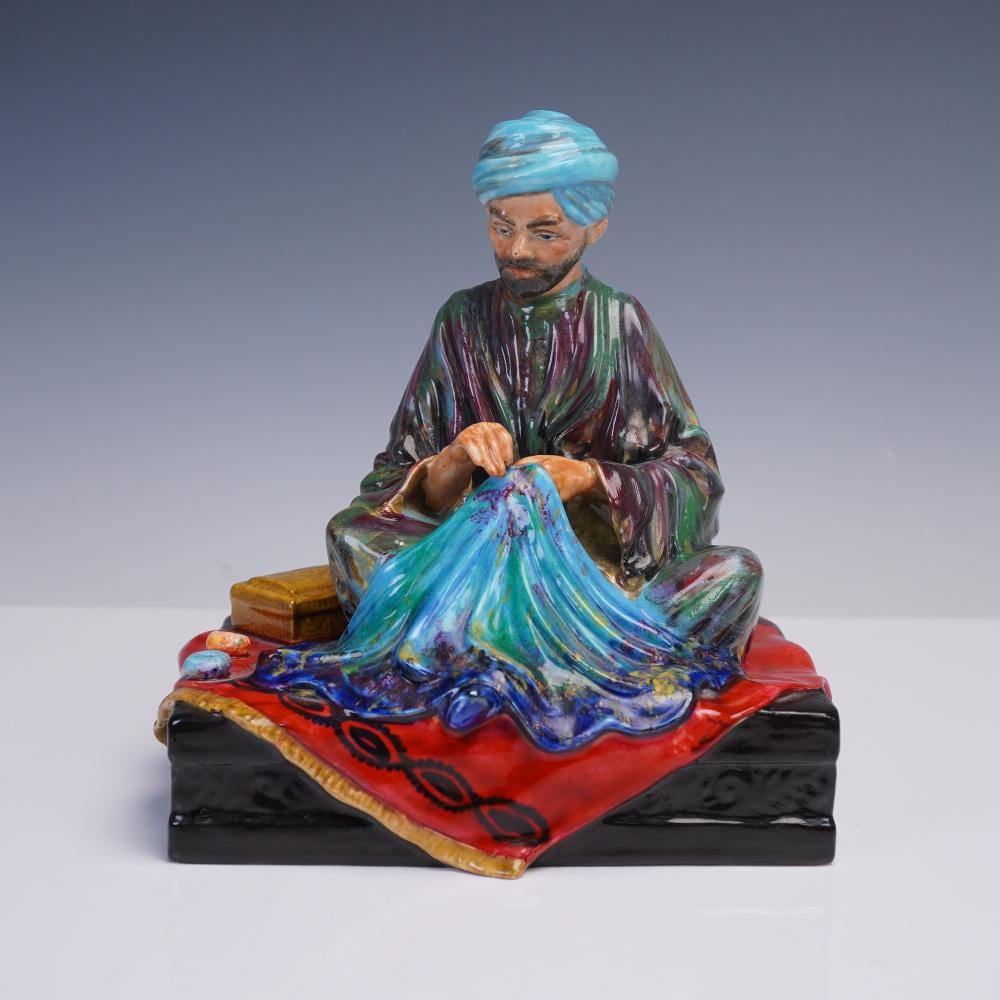 Robert (1770) Johnson comparable auction result: studio pottery figurine embroiderer of kashmir by r johnson