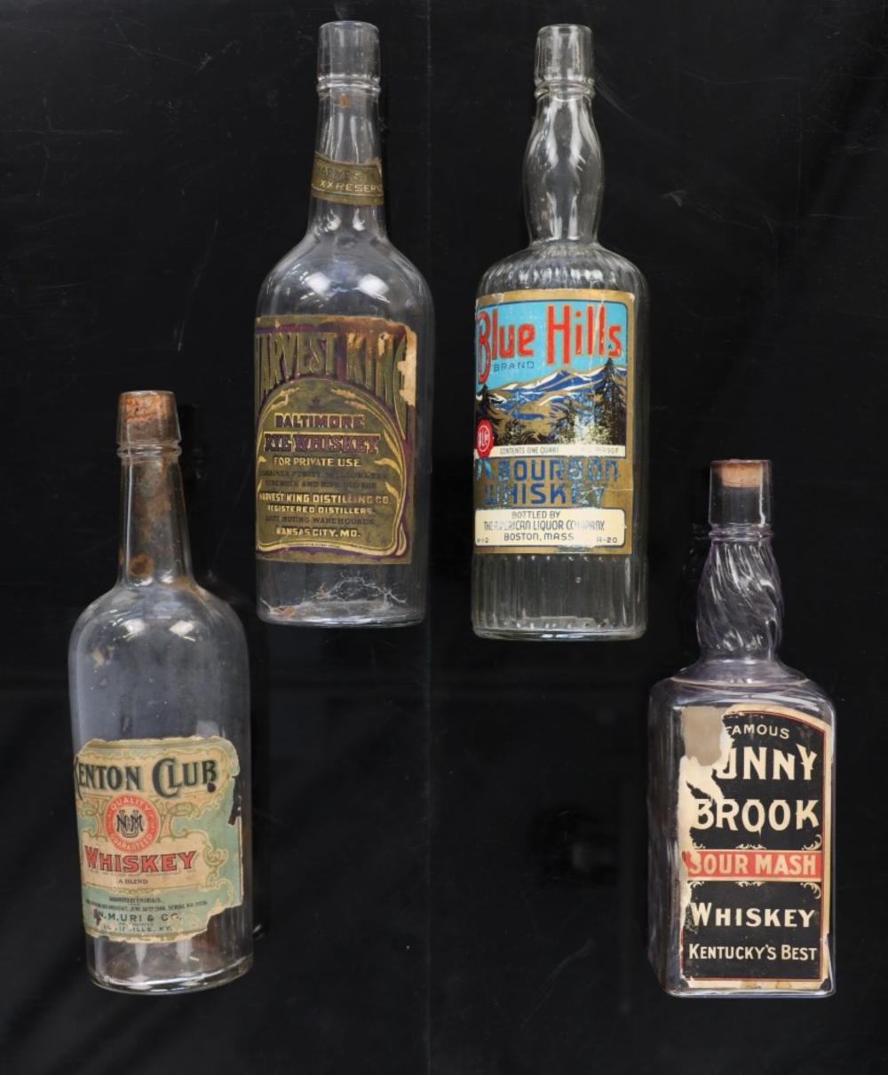 Rare Tombstone Whiskey Bottles, ca. 1890s-1910s sold by North American Auction Company, lot 479 — auction record photograph