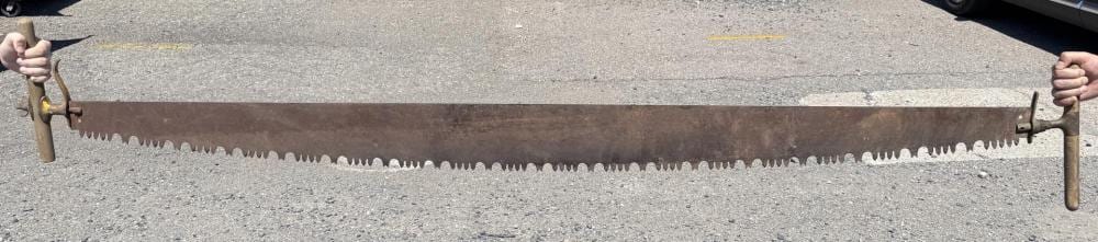 Antique Montana Logging Crosscut Saw sold by Davis Brothers Auction, lot 815 — auction record photograph