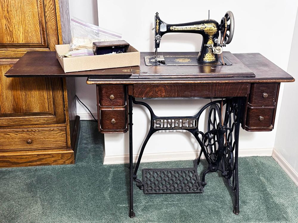NO SHIPPING: Antique Singer treadle sewing machine in oak cabinet – serial #B1484297; fancy gilt decorated machine with iron Singer base sold by Roan Inc. Auctioneers & Appraisers, lot 307 — auction record photograph