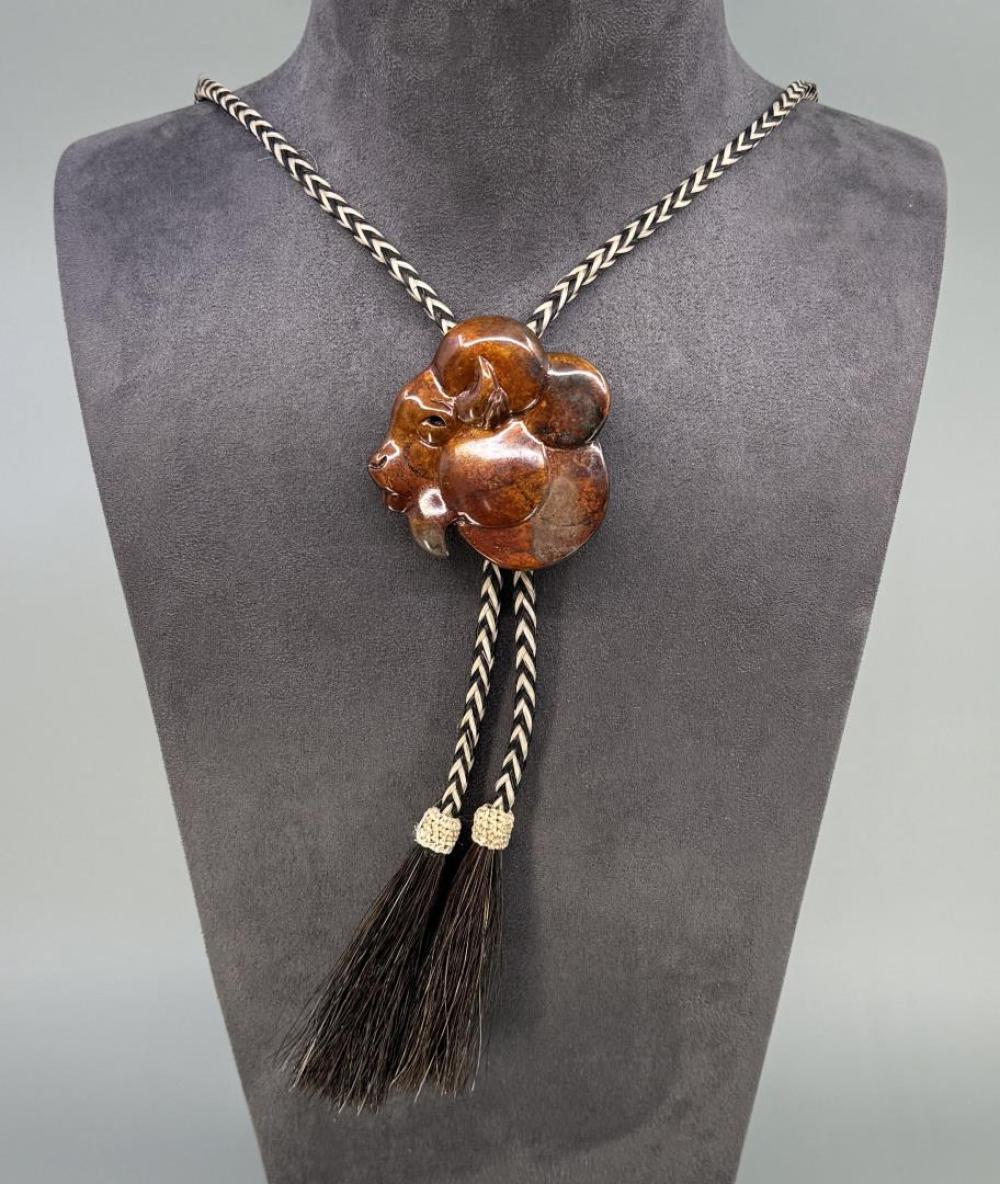 Tim Cherry comparable auction result: tim cherry 2012 prix de west bronze bolo tie