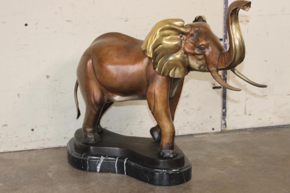 Marius Reynaud comparable auction result: big elephant bronze sculpture on a marble base signed by marius