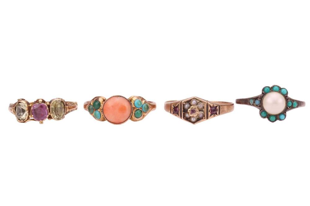 Auction comp thumbnail for A group of four gem-set dress rings; including a Victorian half-hoop ring set with a ruby flanked by two chrysoberyls,to later-added shank testing as 18ct, size M; a Victorian cluster ring set with ruby and seed pearl, hexagonal ring head leading... (Dawsons Auctioneers, Lot 118)