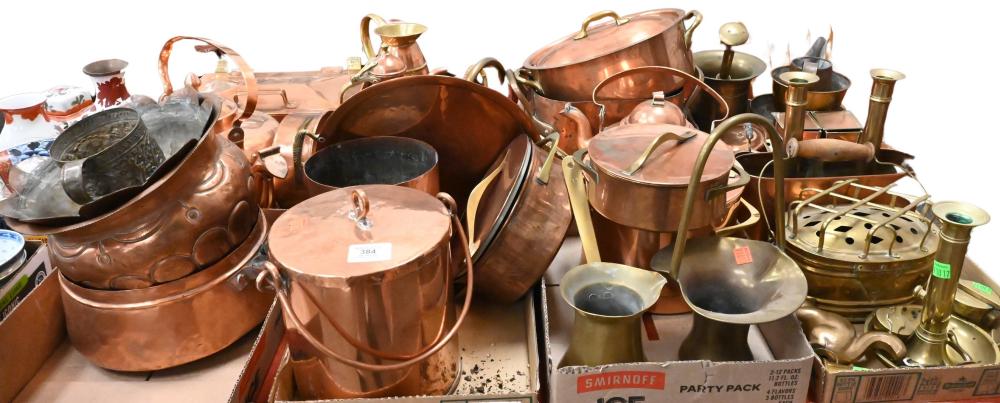 Eight Box Lots of Copper and Brass to include French copper pots, kettles, platters, tea caddy, along with Turkish coffee pot or chocolate pot, brass candlestick holders, mortar and pestle, hand hammered Islamic/Persi... sold by Nadeau's Auction Gallery, lot 384 — auction record photograph