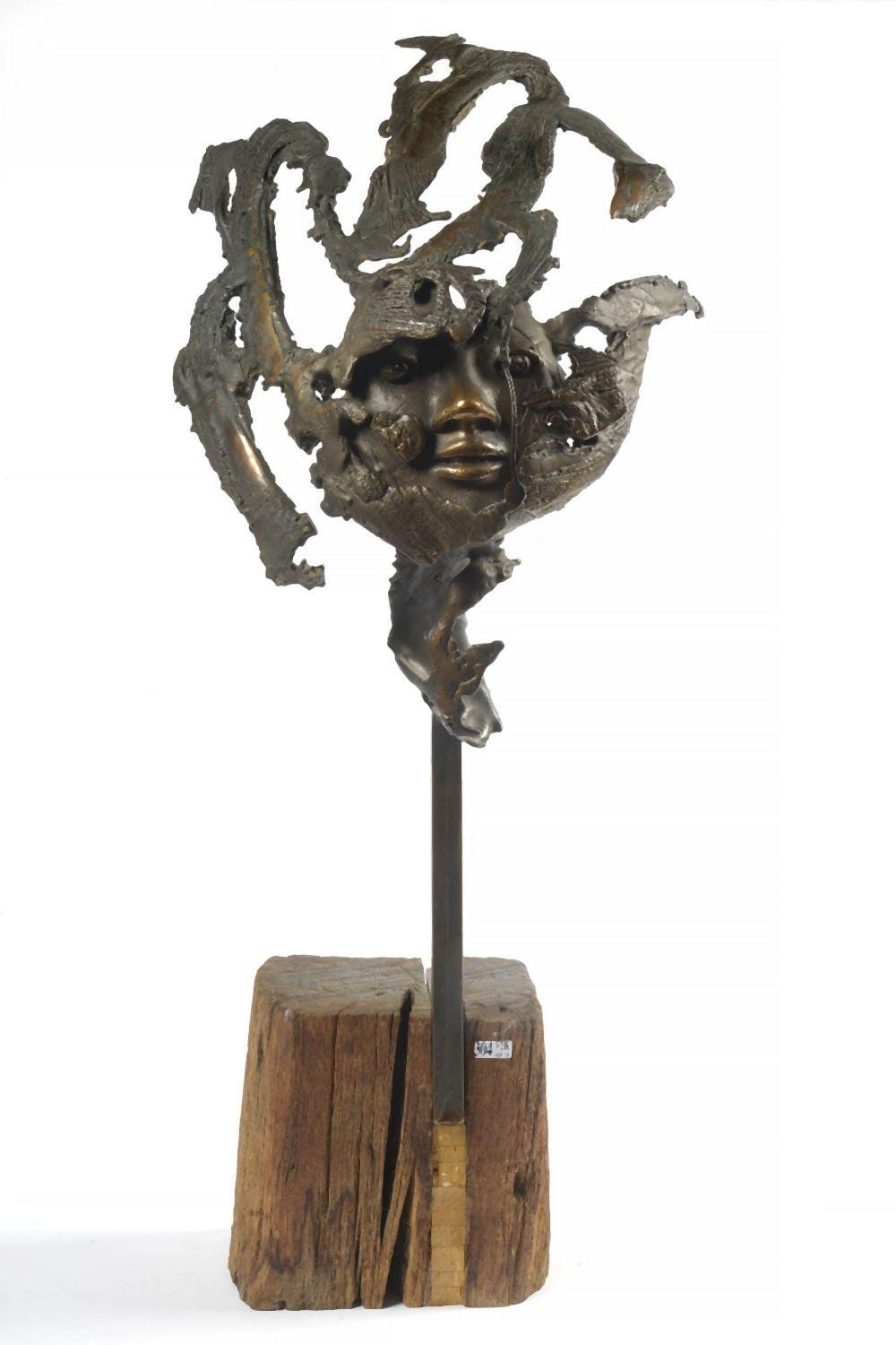 René Julien comparable auction result: masque de femme en bronze patine brune sur un socle en bois monogramm