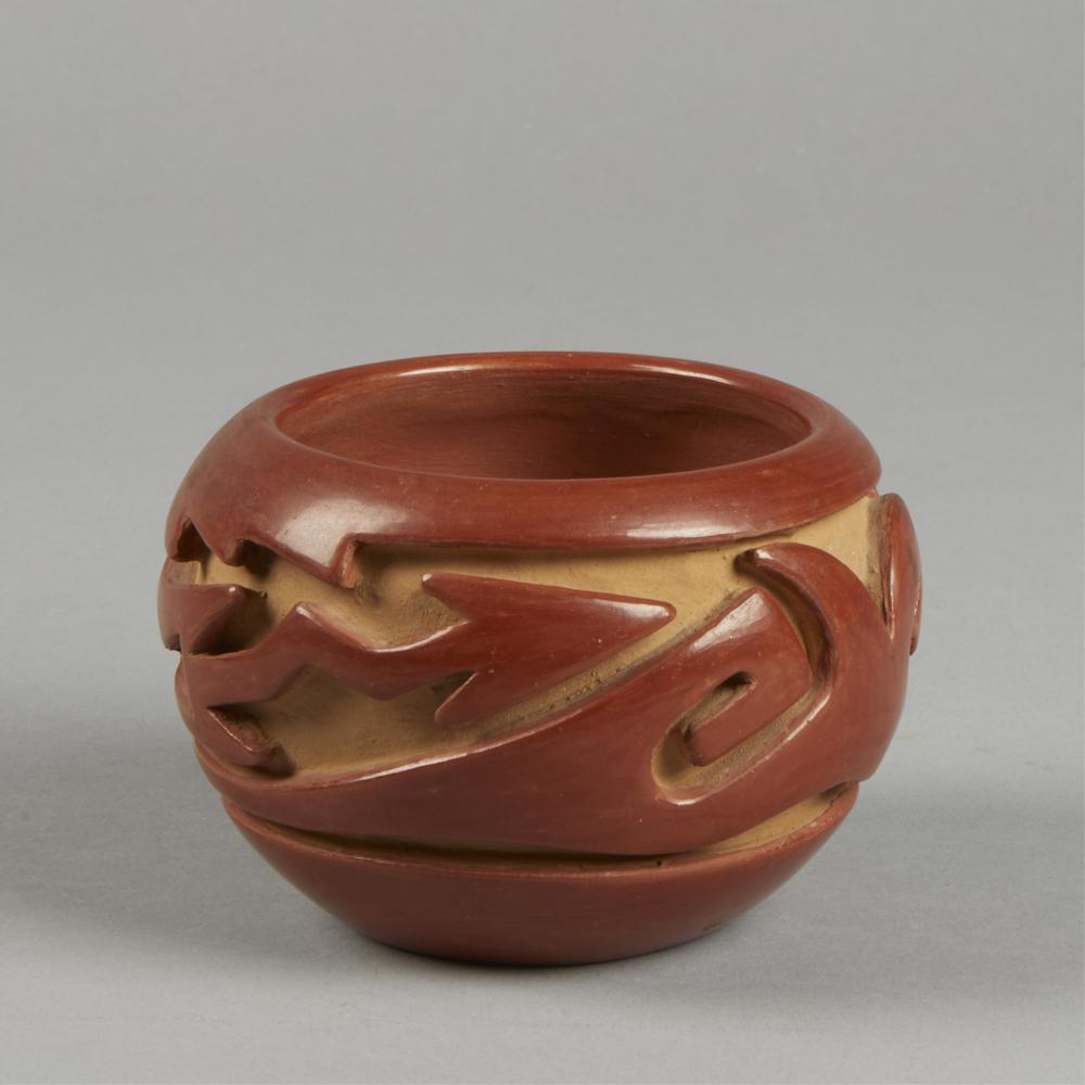 Teresita Naranjo comparable auction result: teresita naranjo carved redware bowl with avanyu design ca 1975
