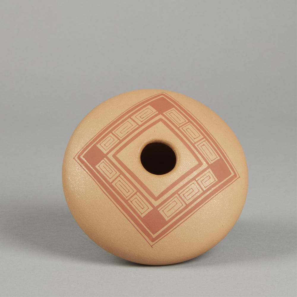 Lonnie Vigil comparable auction result: lonnie vigil micaceous pot with geometric design ca 1975