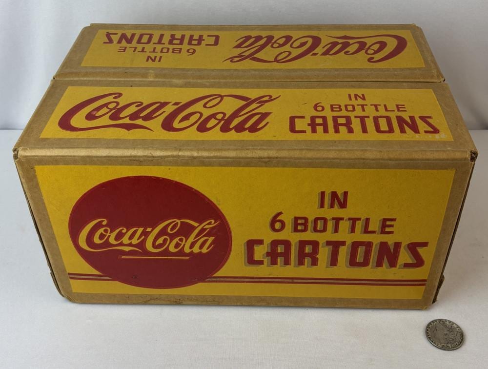 Scarce Vintage 1940's Coca-Cola Yellow Cardboard in 6 Bottle 24 Count Carton NEW OLD STOCK sold by One Source Auctions, lot 88 — auction record photograph