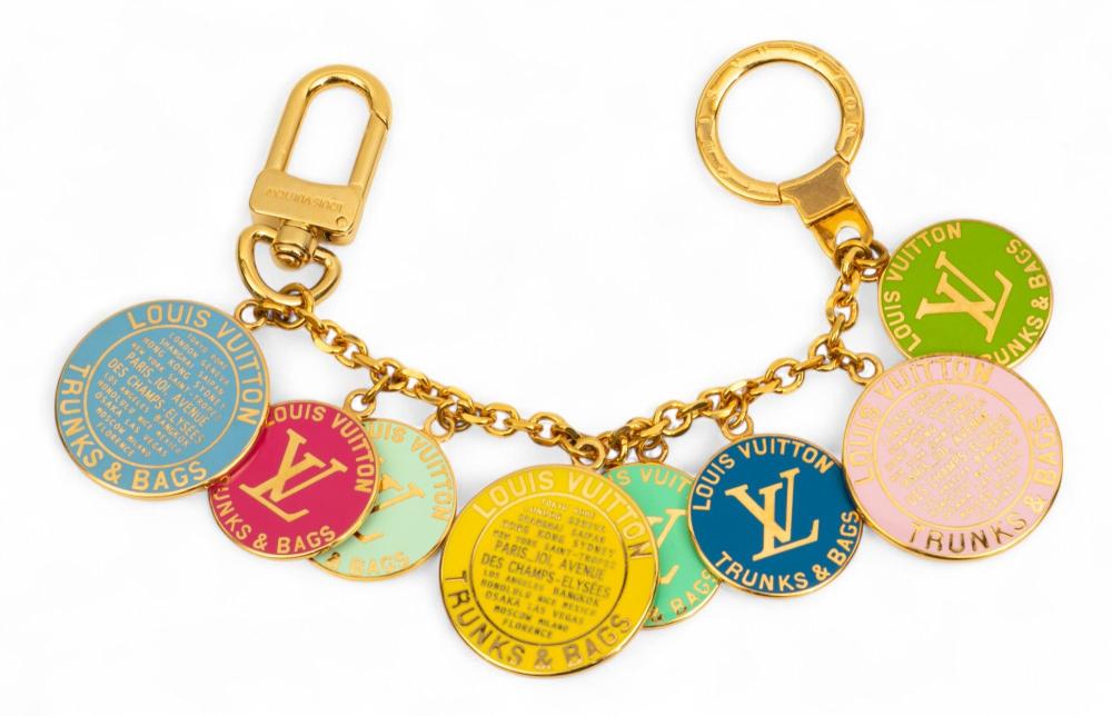 Louis Vuitton (French) Trunk Charms L 6" sold by DuMouchelles, lot 383 — auction record photograph