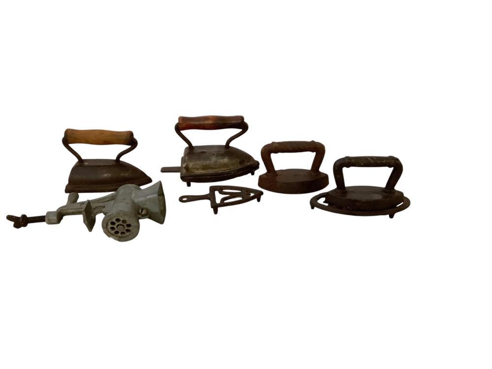 Antique Toy Sad Irons & Meat Grinder sold by Apple Tree Auction Center, lot 1100 — auction record photograph