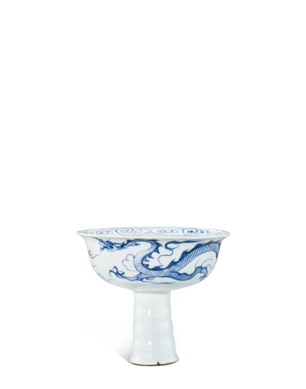A rare blue and white 'dragon' stem cup, Yuan dynasty | 元　青花趕珠雲龍紋高足盃 comparable sale