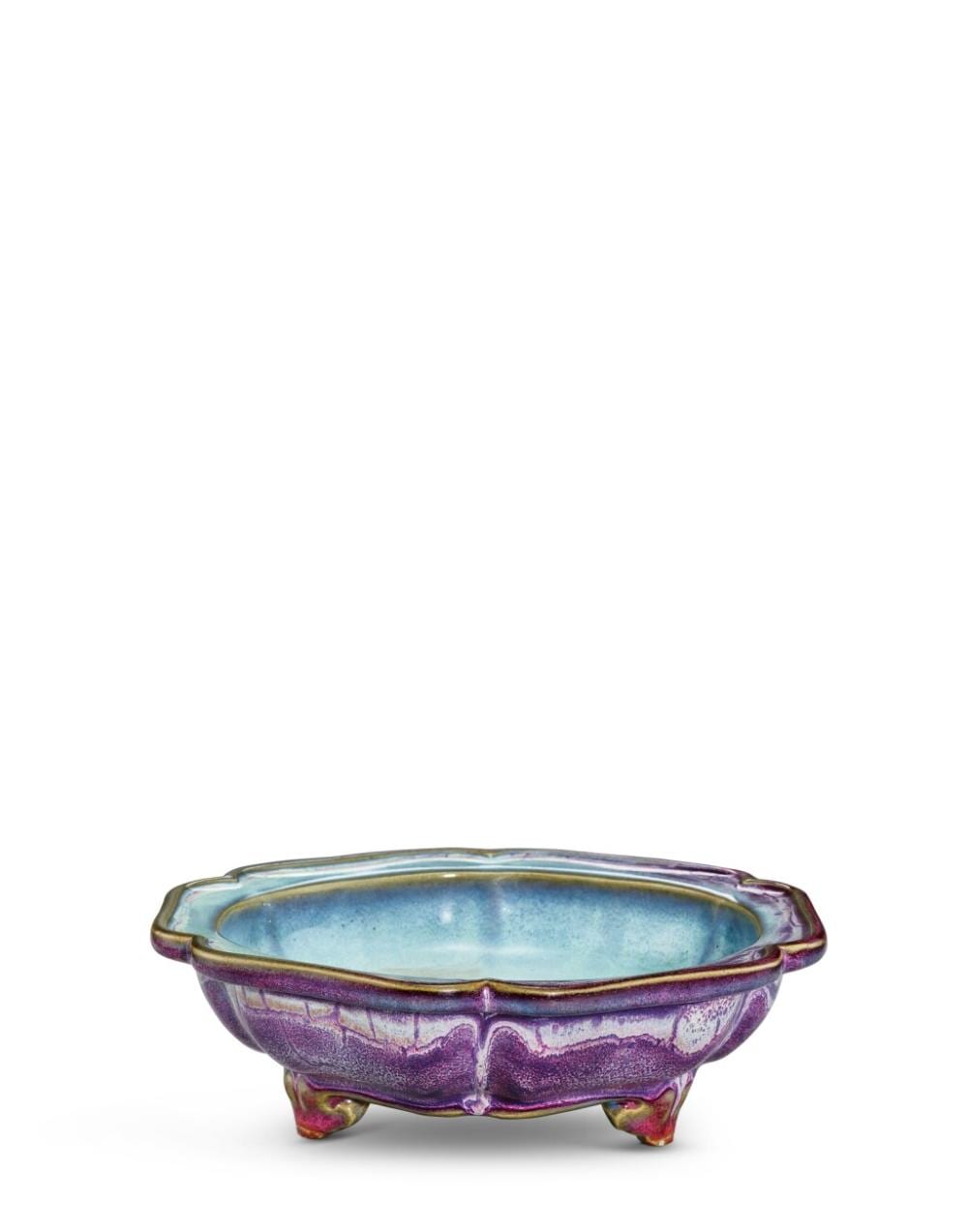 An exceptional imperial Junyao hexalobed narcissus bowl, Early Ming dynasty | 明初　鈞窰玫瑰紫釉三足葵式水仙盆奩　底刻「六」字、「建福宮」、「竹石假山用」款 comparable sale