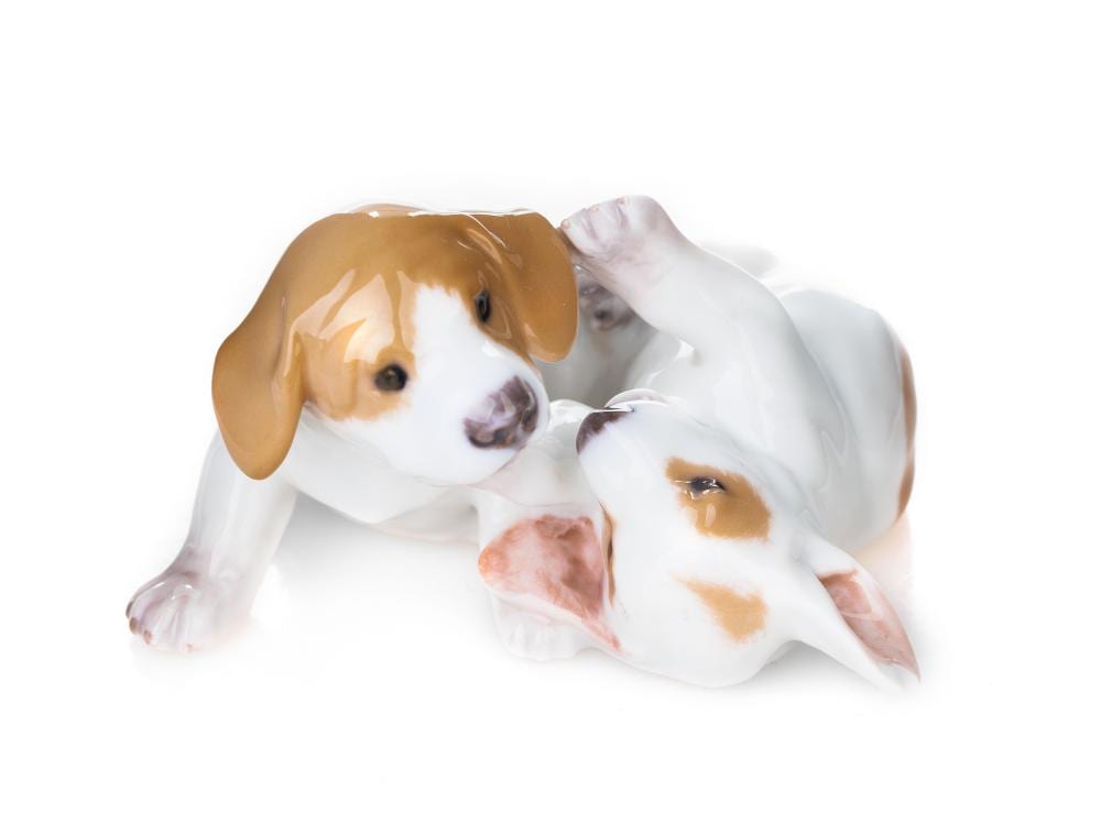Erik Nielsen comparable auction result: erik nielsen 1857 1947 royal copenhagen puppy group before 1923