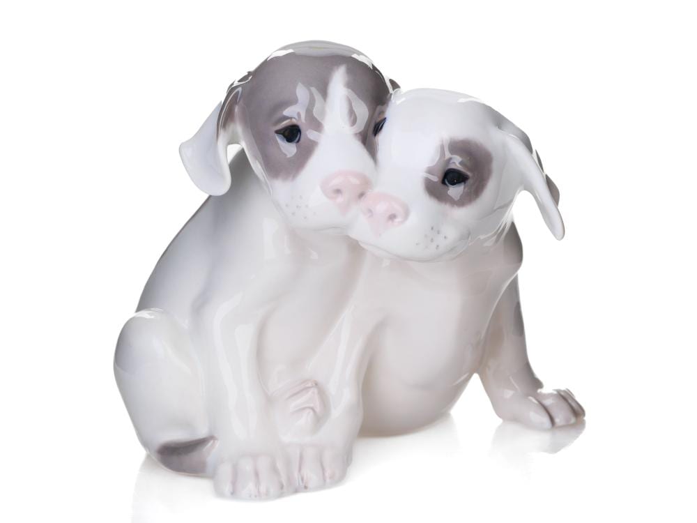 Erik Nielsen comparable auction result: erik nielsen 1857 1947 pointer puppy couple royal copenhagen before 1923