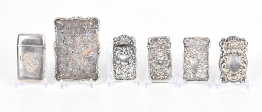 A Group of Silver Match Safes and a Calling Card Case sold by Locati LLC, lot 191 — auction record photograph