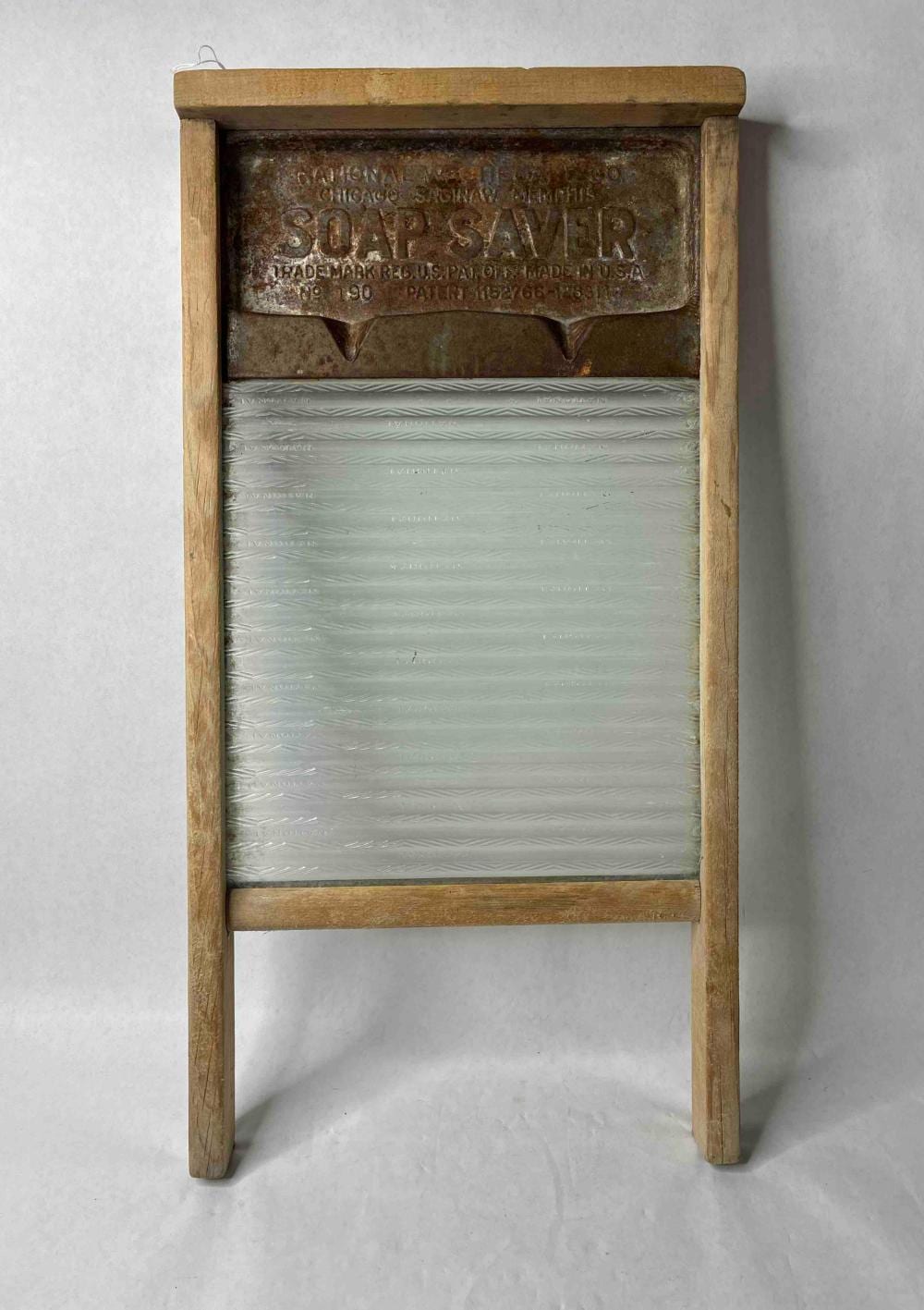 Soap Saver Glass Washboard sold by Atlee Raber Auctioneer, lot 108 — auction record photograph