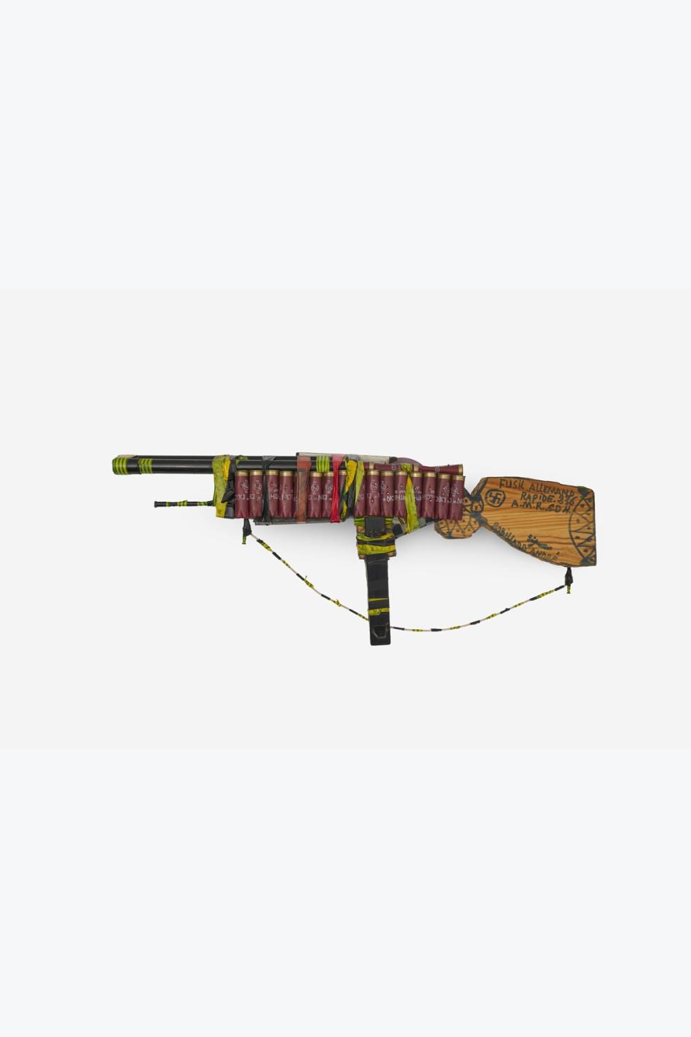 André Robillard comparable auction result: andr robillard n en 1931 fusil allemand rapide plastic metal rope cartridges wood and adhesivetape