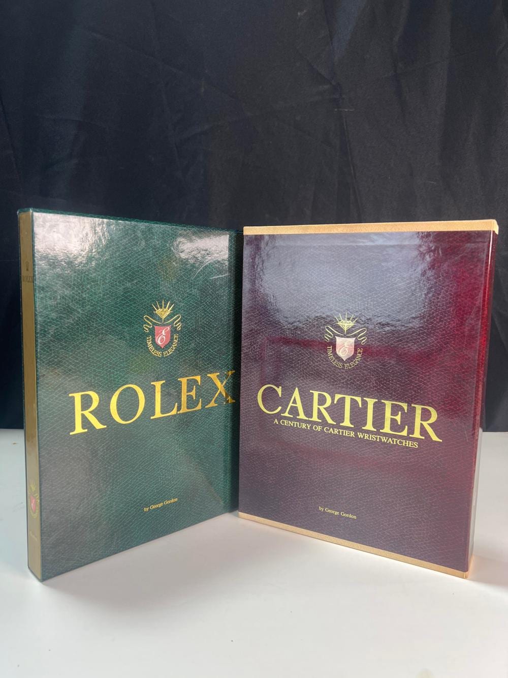 George Gordon comparable auction result: george gordon rolex and cartier timeless elegance books in sleeves