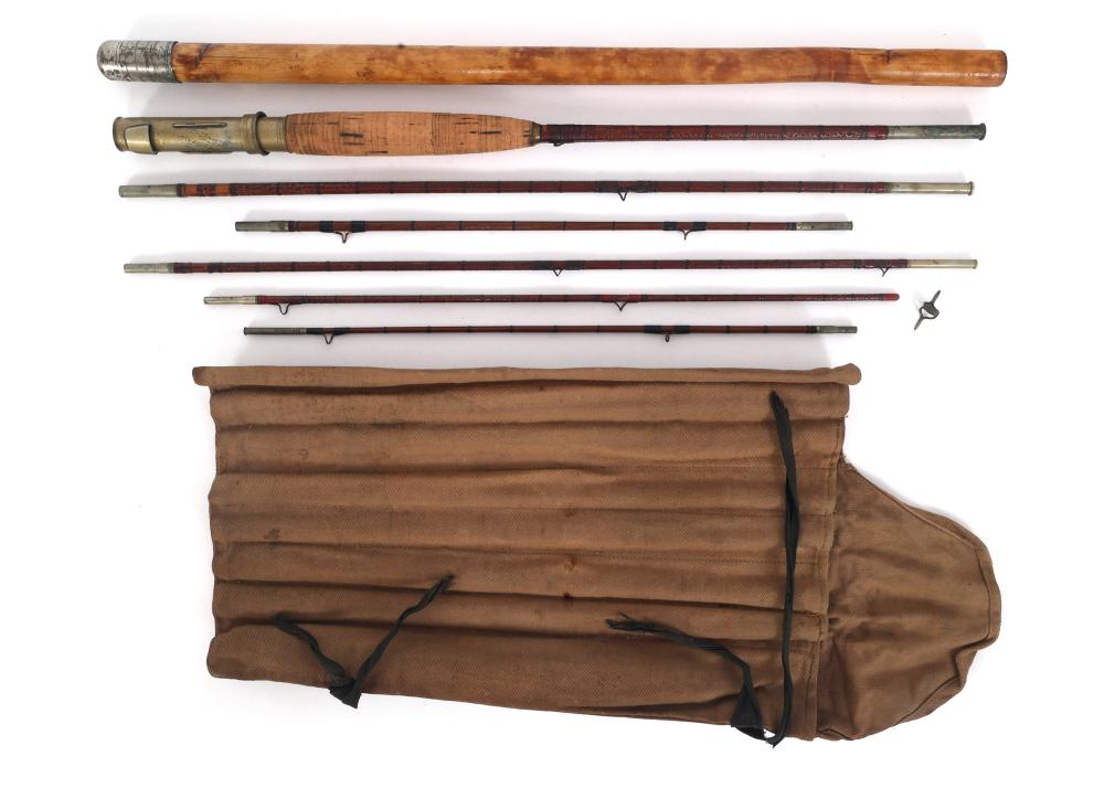 Set of vintage fly fishing rods and a brown cloth rod case laid out on a white background.