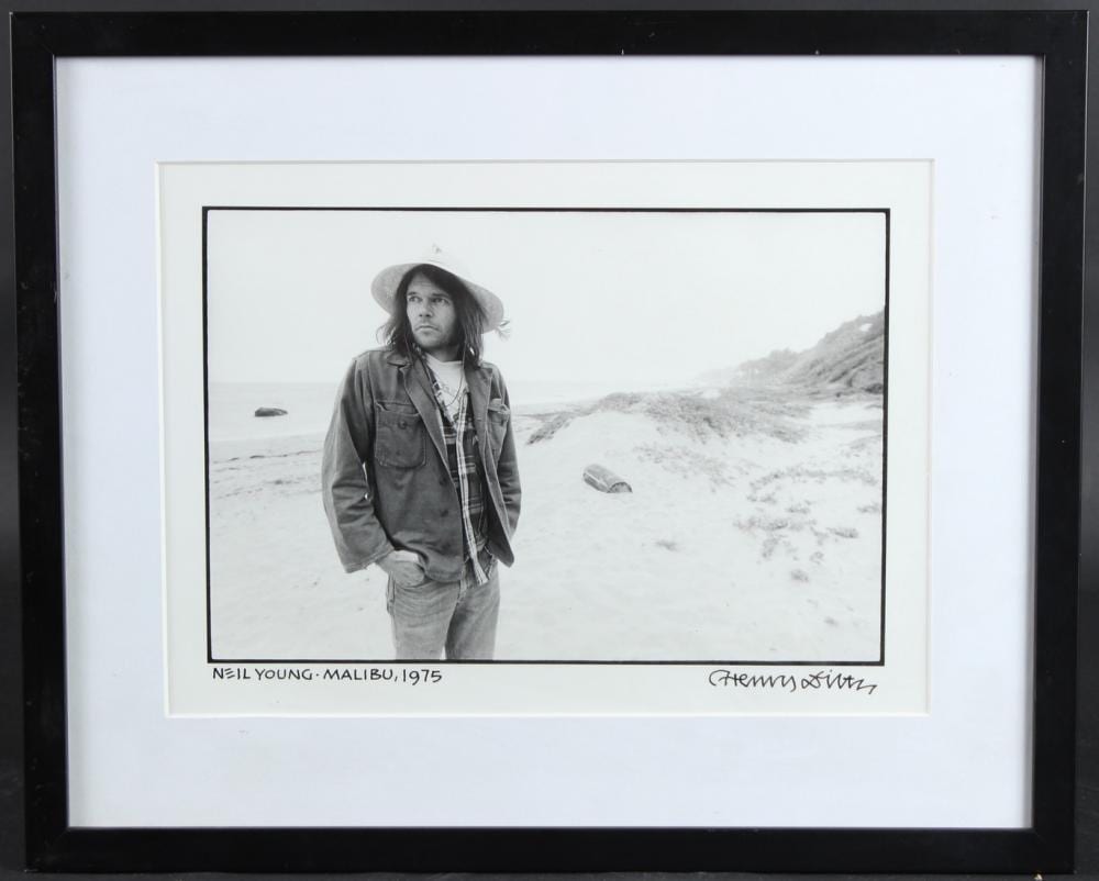 Henry Diltz comparable auction result: henry diltz b 1938 portrait of neil young malibu 1975 silver print photograph inscribed and signed p