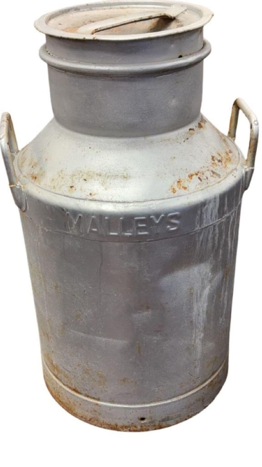 Large vintage metal milk can with handles and lid, gray and white with rust spots and the word “MALLEYS” on the side.