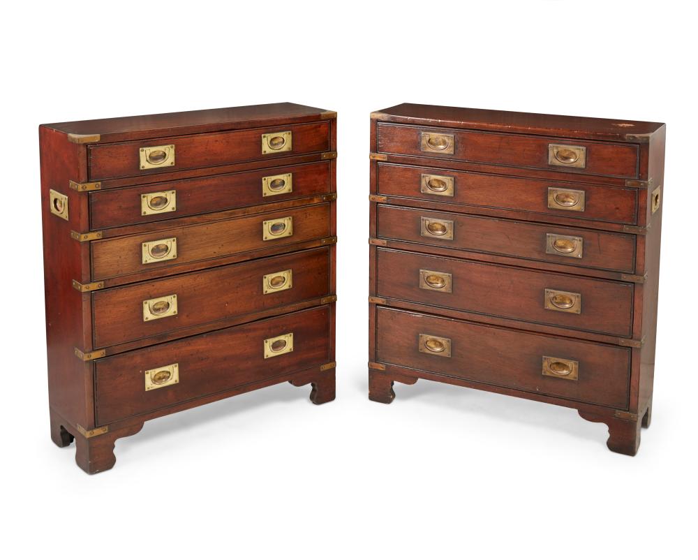 A pair of campaign-style brass-mounted dressers sold by John Moran Auctioneers, lot 327 — auction record photograph