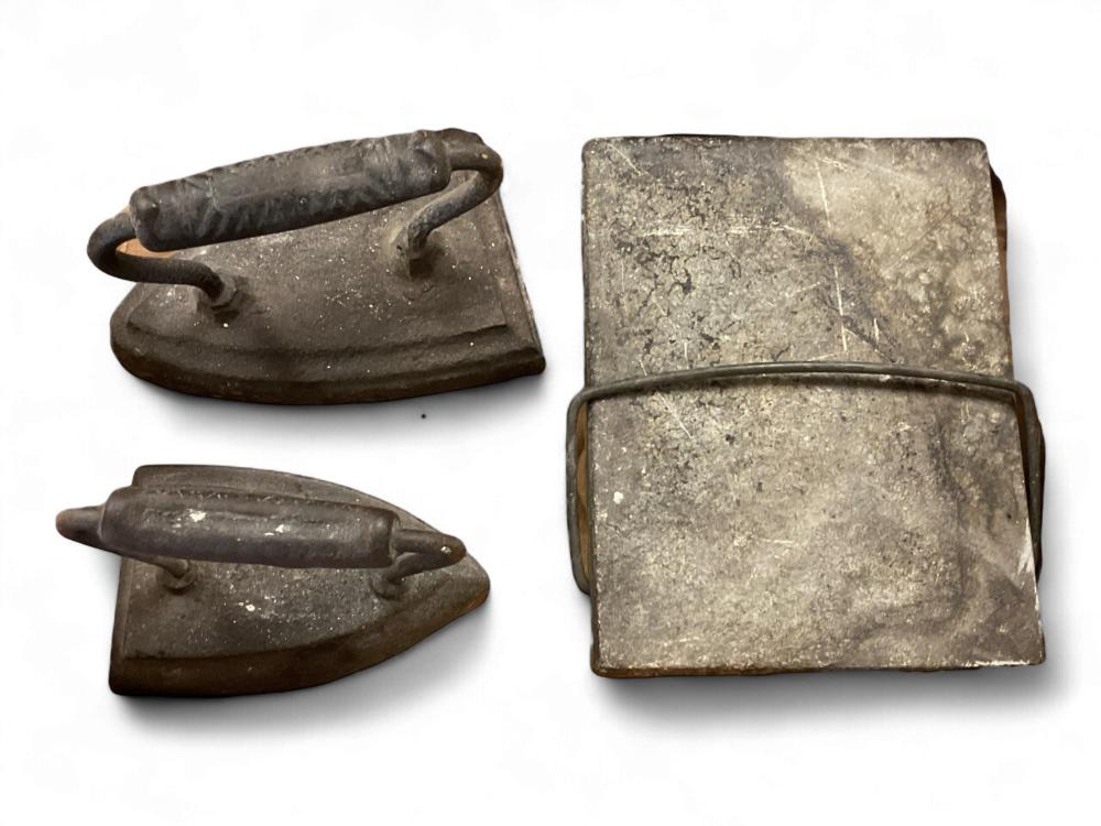 Sad Irons and Warming Soapstone sold by Apple Tree Auction Center, lot 5089 — auction record photograph