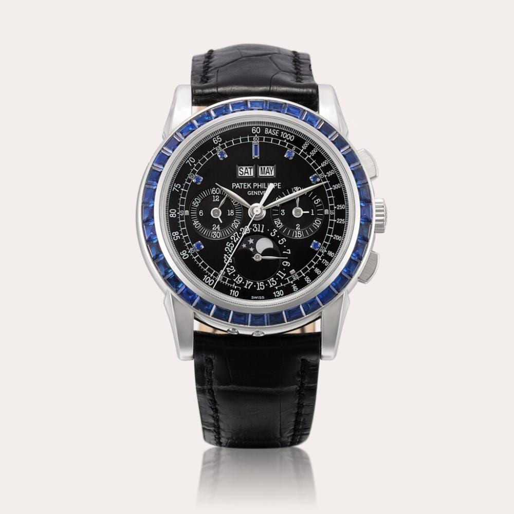 Reference 5971 | A platinum and sapphire-set perpetual calendar chronograph wristwatch with moon phases, leap year and 24 hour indication, Circa 2011 comparable sale