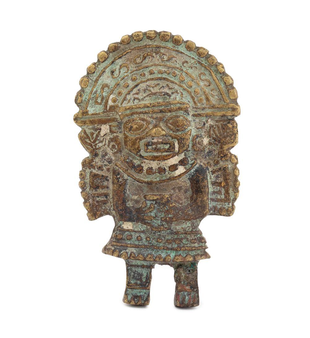 Small standing figure with a rounded headdress, turquoise and brown patina, and carved face details on a white background.