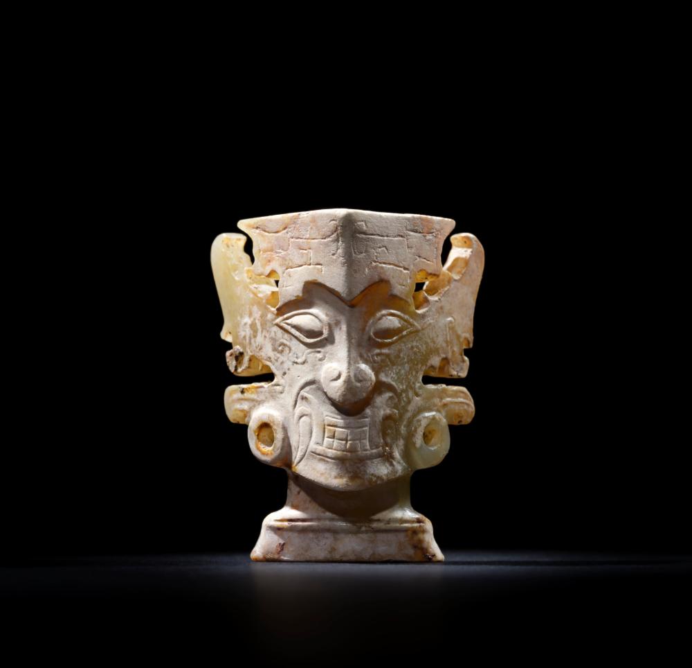 AN IMPORTANT AND EXTREMELY RARE JADE 'DEITY MASK' Late Neolithic period, Post-Shijiahe Culture, c. 2100-1900 BC (2) comparable sale