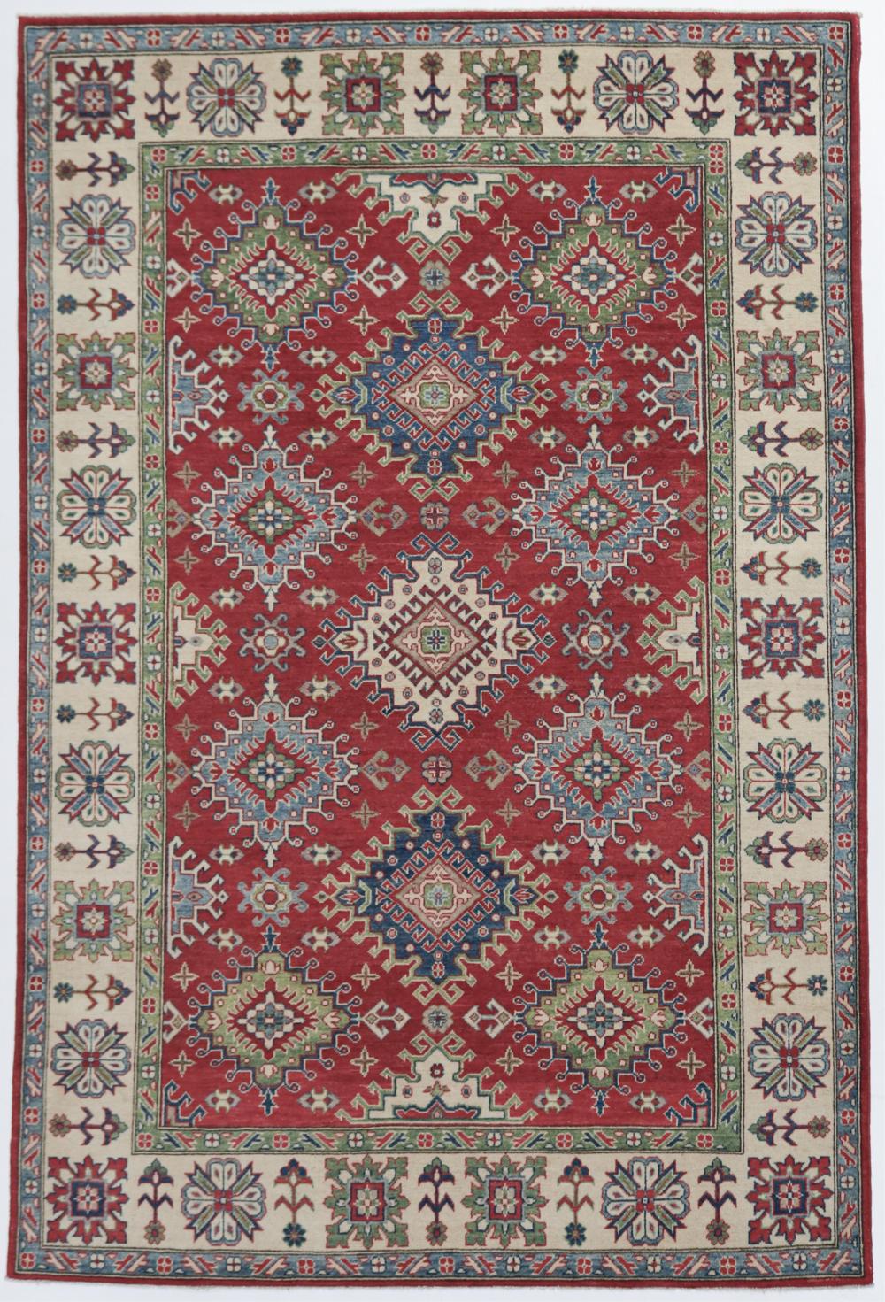 An Afghan Veg Dye Kazak Rug (295 x 199cm). Woven by desert nomads in Northern Afghanistan, using century old weaving techniques. The design is inspired by antique Caucasian Rugs. The field colour is a lovely soft Pome... sold by Lawsons, lot 78 — auction record photograph