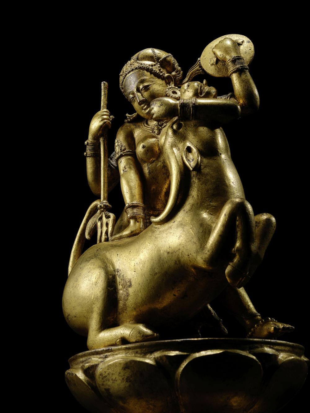 A Gilt Copper Alloy Figure Of Durga Subduing The Buffalo Demon Nepal, THREE MALLA KINGDOMS PERIOD, 1550–1650 CE comparable sale