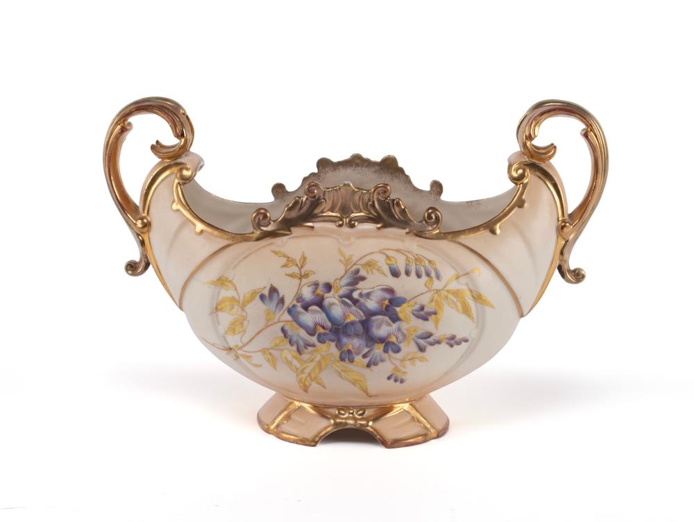 Porcelain double-handle vase with gold trim and a painted blue floral bouquet on the front.