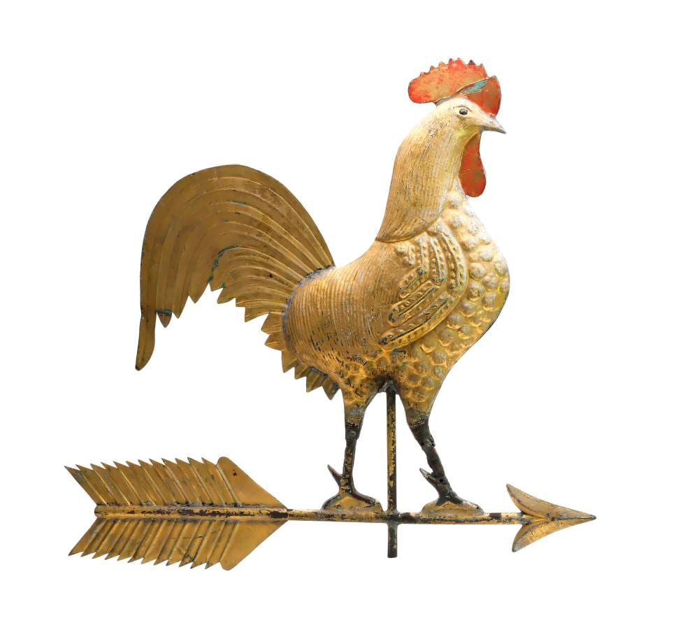 Copper weathervane shaped like a rooster with spread fan-shaped wings and a red crest, shown full body on a metal base.