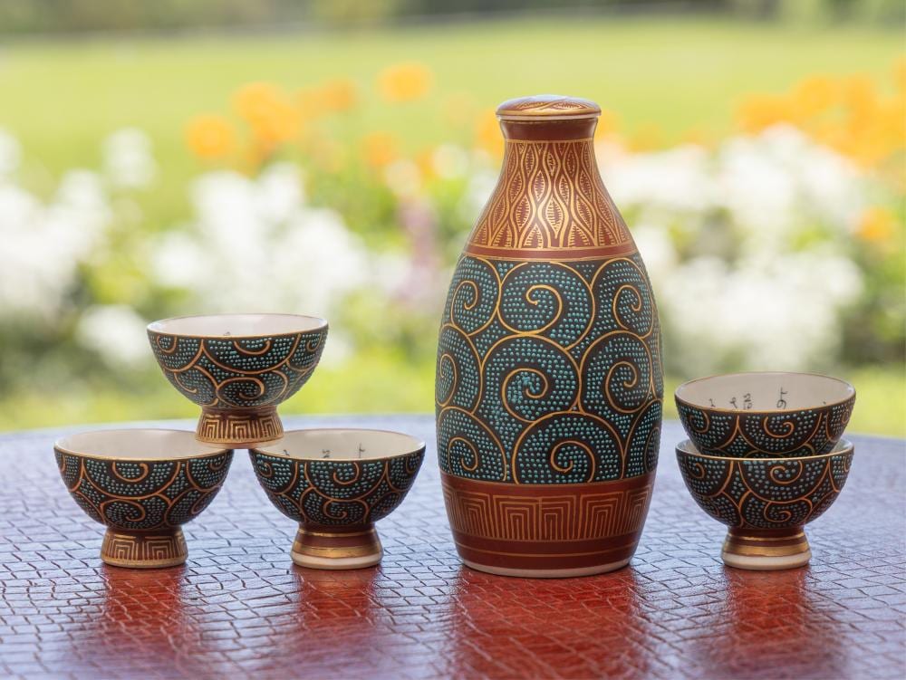 Kutani sake set, bottle height 13cm sold by Lawsons, lot 75 — auction record photograph