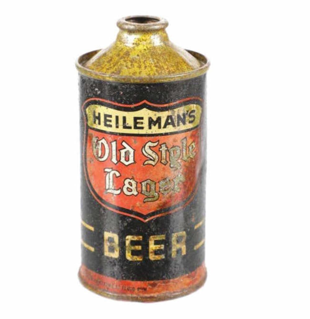 A vintage beer can with a yellow bottle-cap top and a label reading “HEILEMAN’S” and “Old Style Lager.”