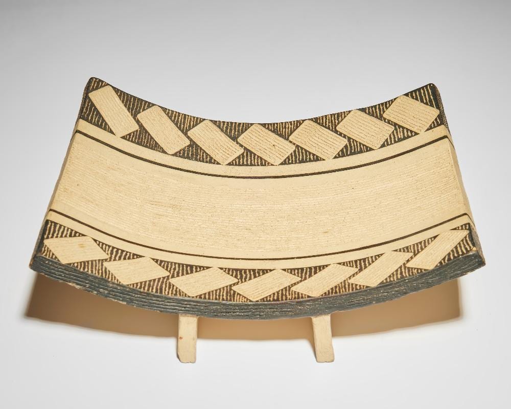 jason wason b 1946 rectangular dish of curving form raised on two feet with combed decoration circa 2000 · Roseberys · 2025-11-18 Jason Wason comparable auction result: jason wason b 1946 rectangular dish of curving form raised on two feet with combed decoration circa 2000