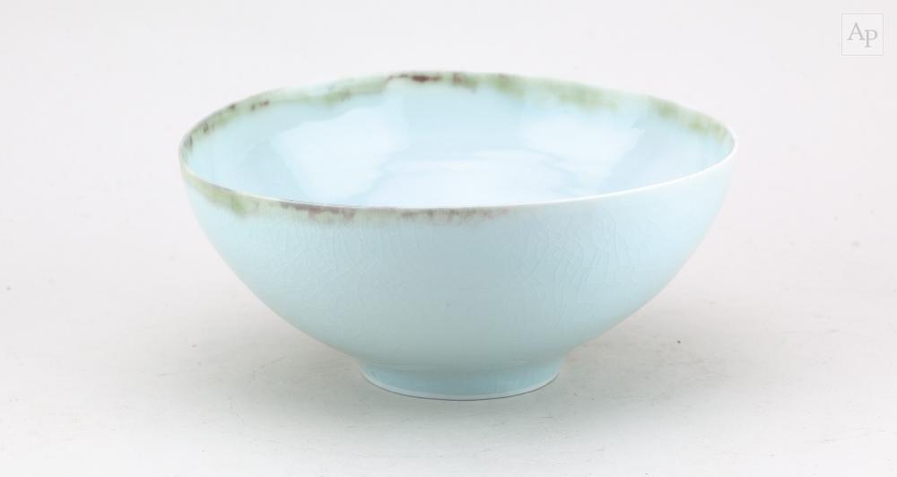 Edmund de Waal comparable auction result: edmund de waal born 1964 a porcelain bowl covered in pale celadon glaze with faint iron rim impressed e mark partially glaze filled diameter 22cm