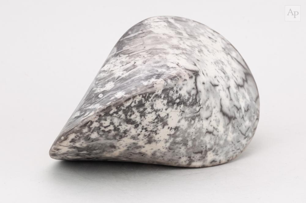 Eric Moss comparable auction result: eric moss born 1959 smoked oloid a naked raku mussel form with marbled monochrome surface impressed mark length 22cm