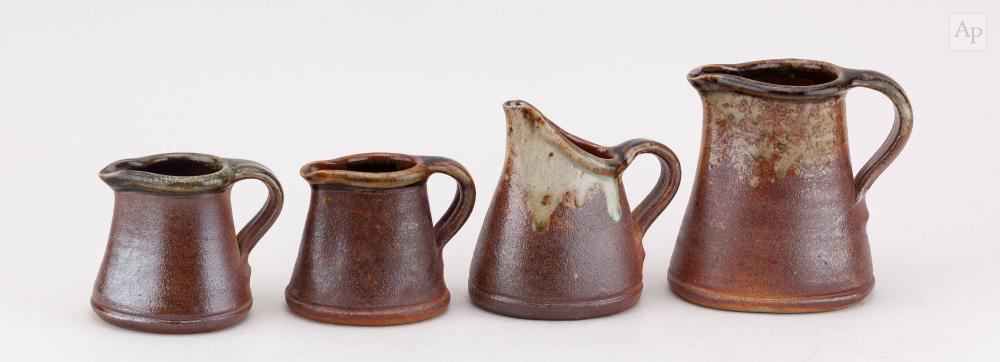 John Leach comparable auction result: john leach 1939 2021 for muchelney pottery a quartet of wood fired stoneware jugs impressed jhl and pottery marks dated 1995 2004 and 2005 tallest 12cm 4