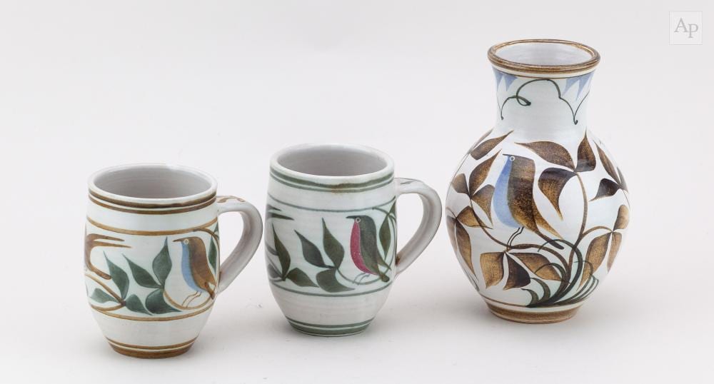 laurence mcgowan born 1942 a maiolica style stoneware carafe decorated with birds and leaves painted mcg and year marks made 1989 height 16cm and a pair of mugs 3 · Adam Partridge Auctioneers · 2025-11-21 Laurence McGowan comparable auction result: laurence mcgowan born 1942 a maiolica style stoneware carafe decorated with birds and leaves painted mcg and year marks made 1989 height 16cm and a pair of mugs 3