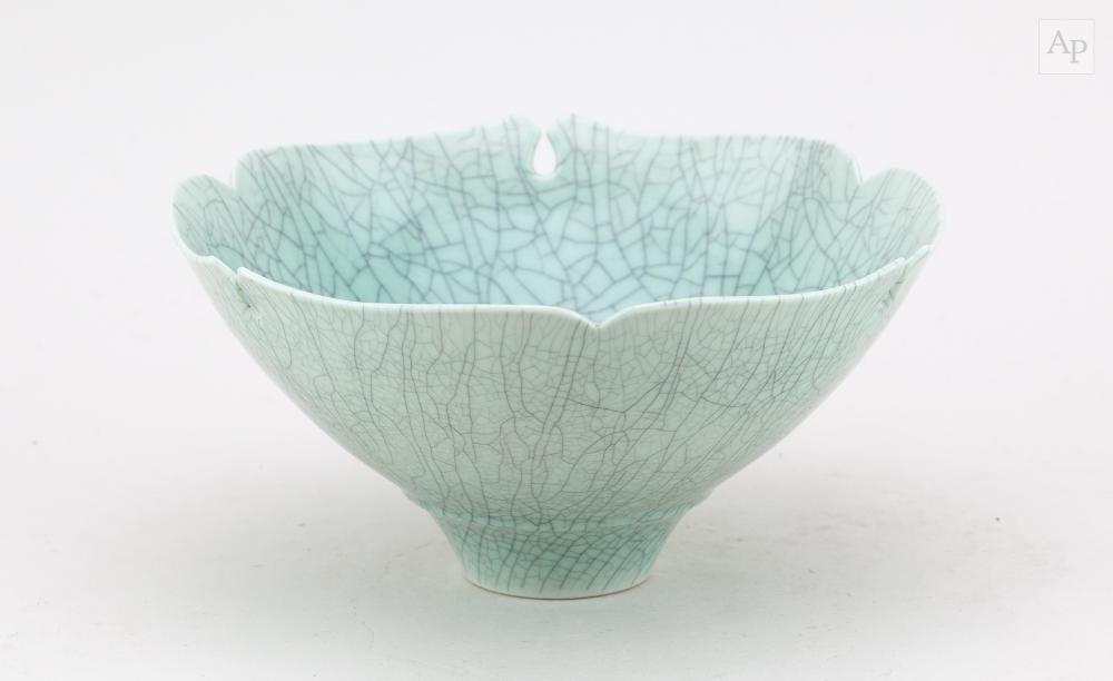 Peter Lane comparable auction result: peter lane born 1932 a porcelain bowl with carved rim covered in celadon crackle glaze incised signature diameter 21 5cm