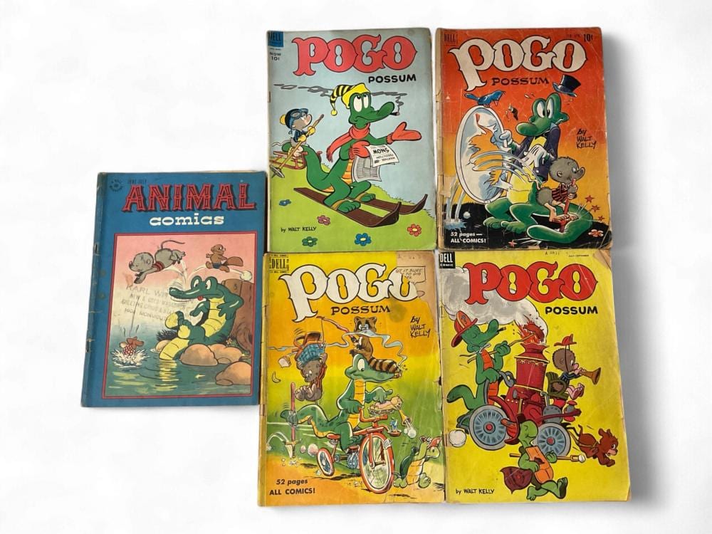 Five comic book covers featuring cartoon animals: Pogo Possum (green possum), and Animal Comics (green alligator).