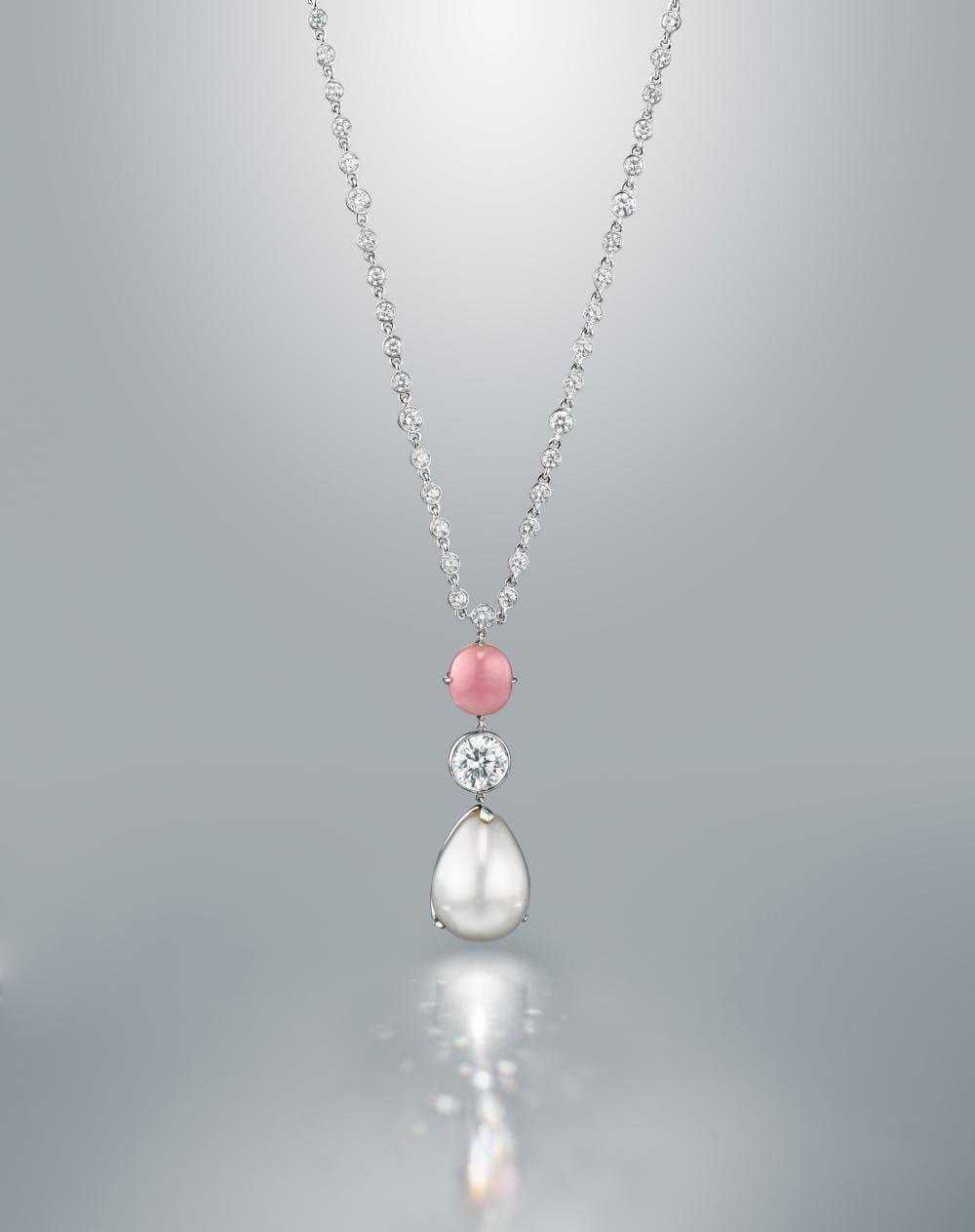 Natural Pearl, CONCH PEARL AND DIAMOND NECKLACE. comparable sale