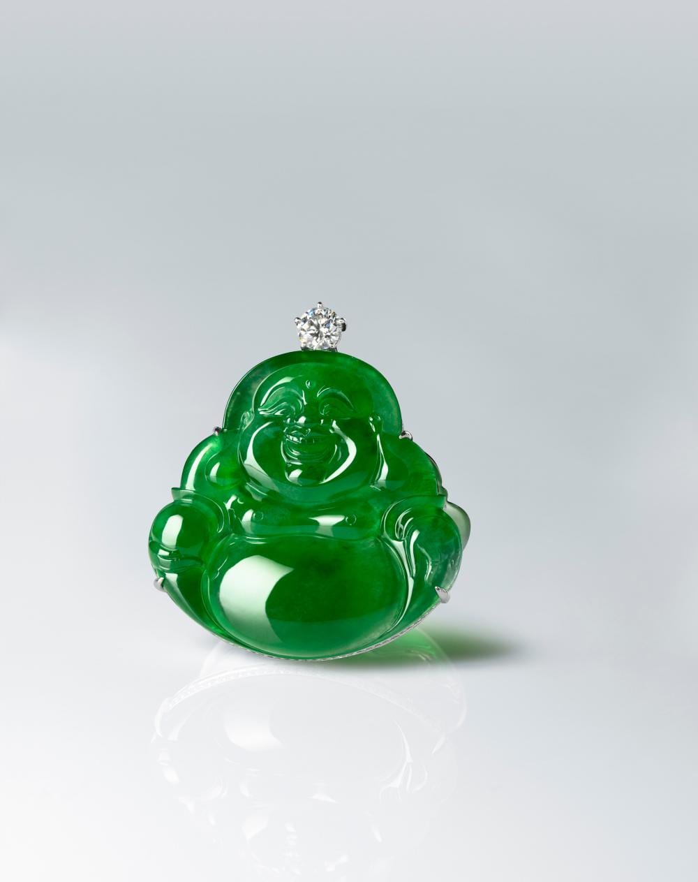 An Important Jadeite And Diamond Pendant. comparable sale