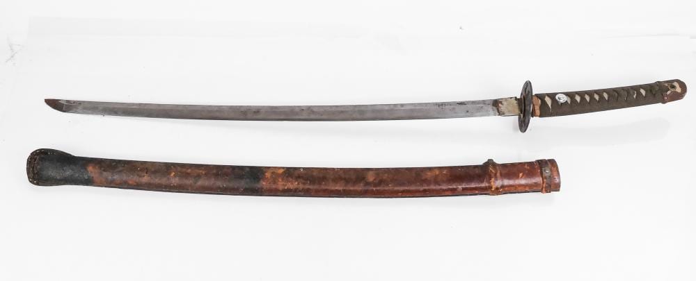 Long Japanese katana-style sword with dark metal blade and brown handle, shown alongside its scabbard on a white background.